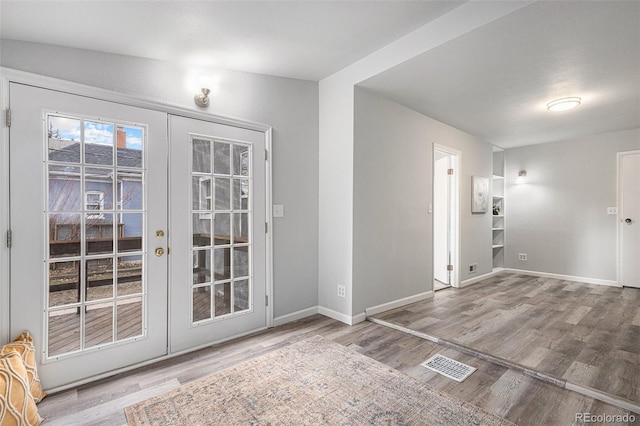 225 N Cedar St, Colorado Springs, CO 80903 - interior space with visible vents, baseboards, and wood finished floors