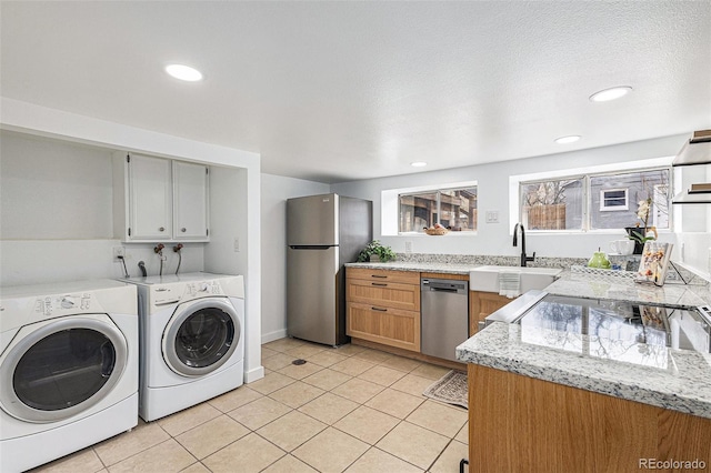 225 N Cedar St, Colorado Springs, CO 80903 - washroom with laundry area, light tile patterned floors, recessed lighting, washing machine and clothes dryer, and a sink