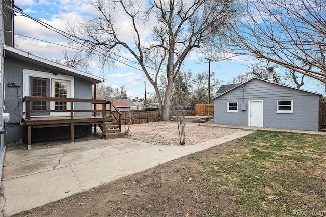 225 N Cedar St, Colorado Springs, CO 80903 - view of yard featuring a patio, an outbuilding, a deck, and fence private yard