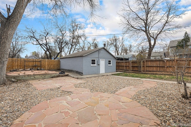 225 N Cedar St, Colorado Springs, CO 80903 - view of patio / terrace featuring an outbuilding and a fenced backyard