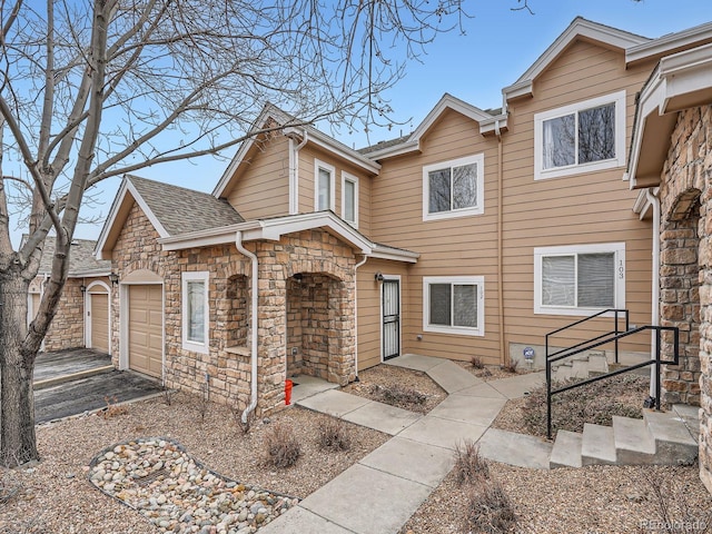 view of front of home with a garage