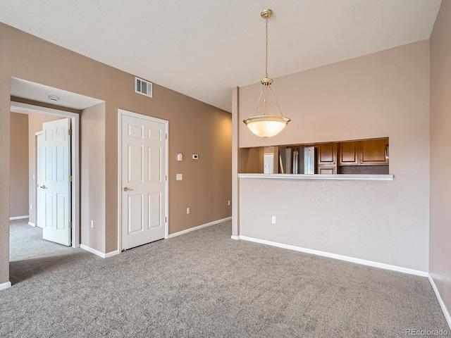 empty room featuring carpet flooring