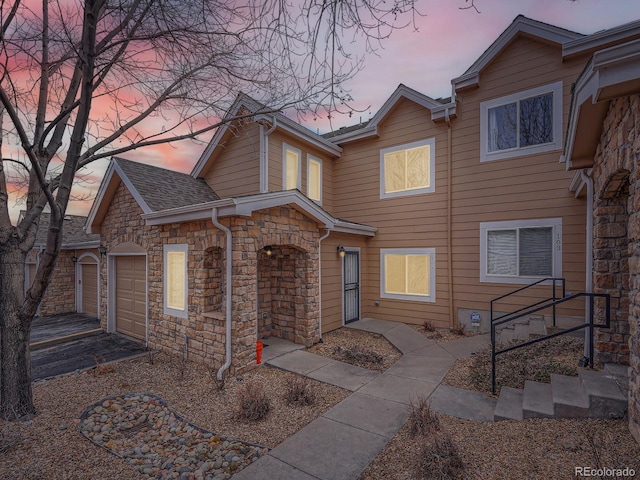 view of front of property with a garage