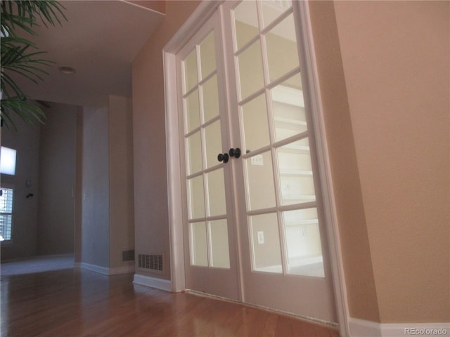 518 Zircon Way, Superior, CO 80027 - detailed view of french doors, wood finished floors, and baseboards