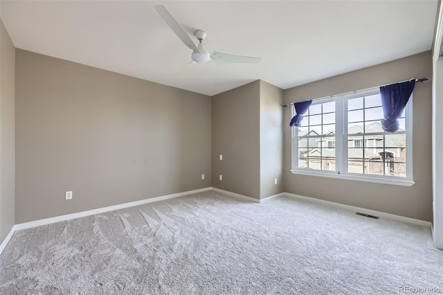 518 Zircon Way, Superior, CO 80027 - spare room with carpet, a ceiling fan, and baseboards