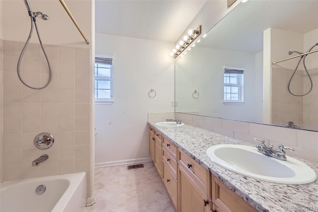 518 Zircon Way, Superior, CO 80027 - bathroom featuring double vanity, tub / shower combination, and baseboards