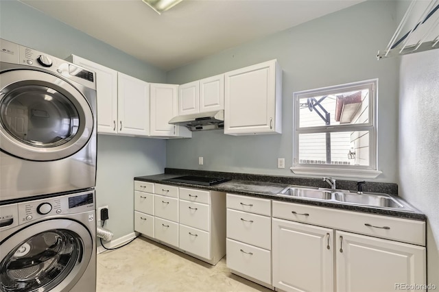518 Zircon Way, Superior, CO 80027 - washroom featuring stacked washer / drying machine and cabinet space