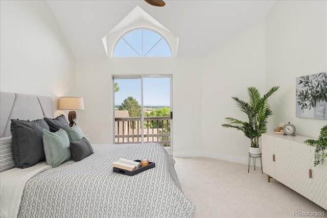 3413 W 114th Cir Unit B, Westminster, CO 80031 - bedroom featuring access to exterior, carpet, and high vaulted ceiling