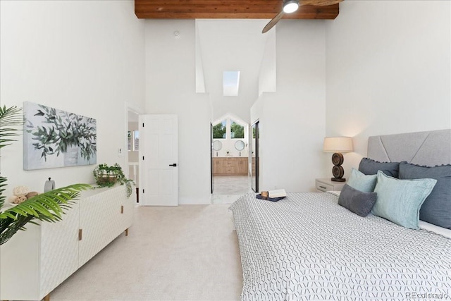 3413 W 114th Cir Unit B, Westminster, CO 80031 - bedroom with a high ceiling, light carpet, ensuite bathroom, and beam ceiling