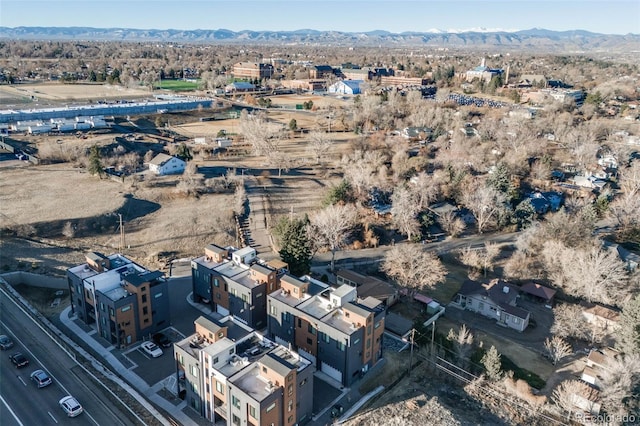 drone / aerial view featuring a mountain view