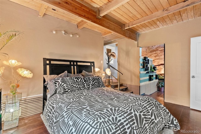 6619 Apache Pl, Larkspur, CO 80118 - bedroom with wooden ceiling with exposed beams and hardwood / wood-style flooring