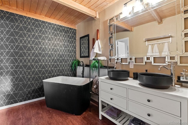 6619 Apache Pl, Larkspur, CO 80118 - bathroom featuring wood ceiling with exposed beams, double vanity, wood finished floors, and a freestanding bath