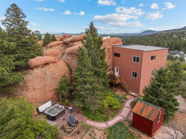 6619 Apache Pl, Larkspur, CO 80118 - view of subject property featuring a mountain backdrop