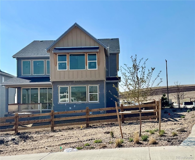 16947 W 92nd Dr, Arvada, CO 80007 - view of front of home featuring board and batten siding and roof with shingles