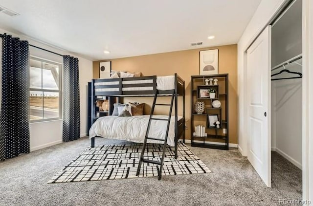 16947 W 92nd Dr, Arvada, CO 80007 - bedroom with carpet flooring, baseboards, a closet, and recessed lighting