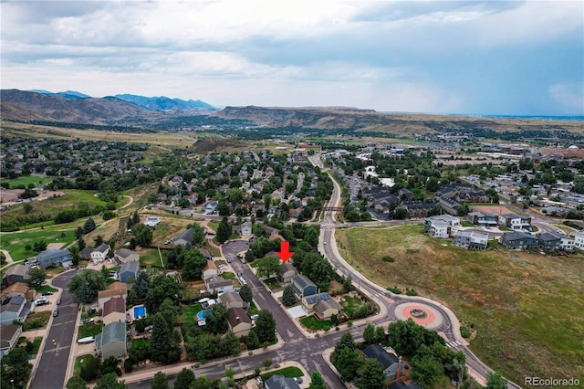 312 Allen St, Golden, CO 80401 - aerial overview of property's location featuring nearby suburban area and a mountain backdrop
