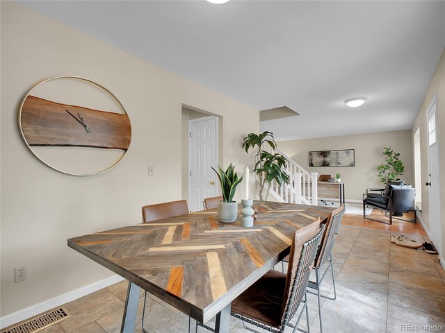 312 Allen St, Golden, CO 80401 - dining room with stairs and baseboards