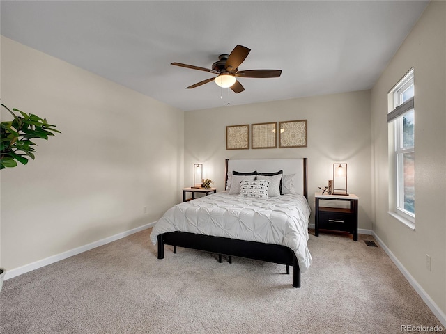 312 Allen St, Golden, CO 80401 - carpeted bedroom with baseboards and a ceiling fan