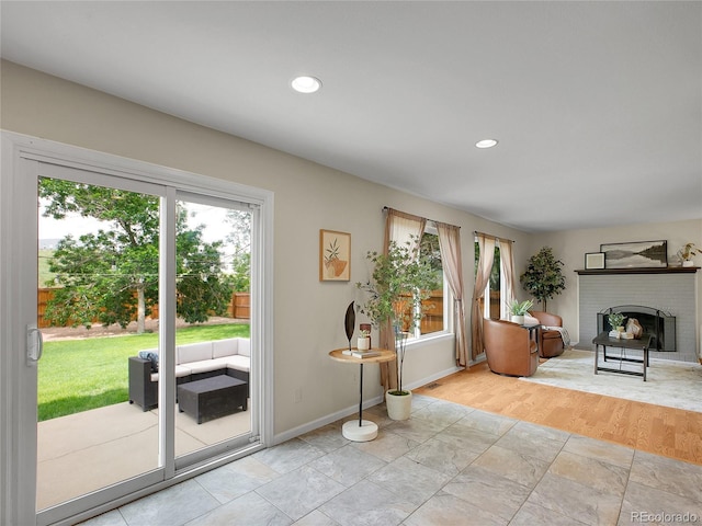 312 Allen St, Golden, CO 80401 - entryway featuring a brick fireplace and recessed lighting