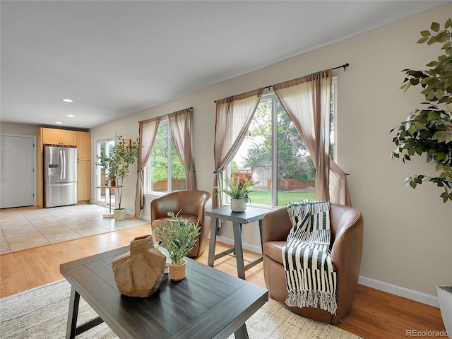 312 Allen St, Golden, CO 80401 - living room featuring light wood-type flooring and recessed lighting
