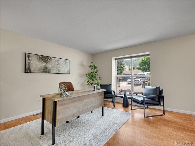 312 Allen St, Golden, CO 80401 - office area featuring light wood-style floors and baseboards