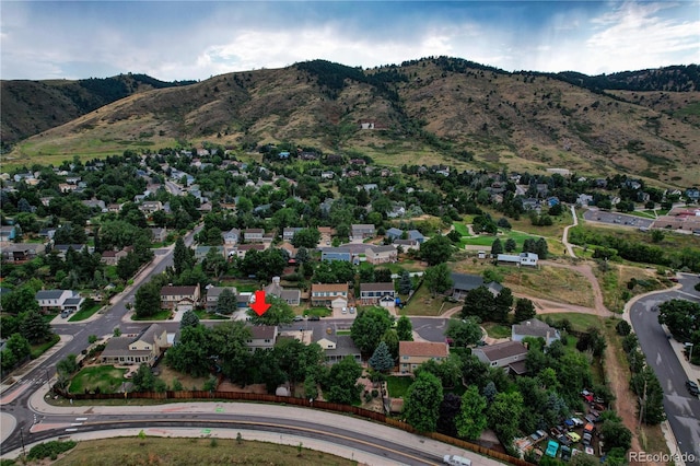 312 Allen St, Golden, CO 80401 - aerial view of property and surrounding area featuring a mountainous background and nearby suburban area
