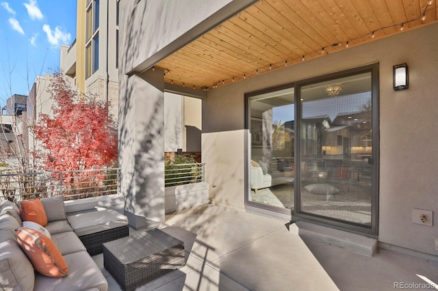 view of patio / terrace featuring outdoor lounge area and a balcony