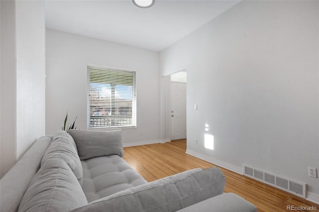 living room with hardwood / wood-style flooring