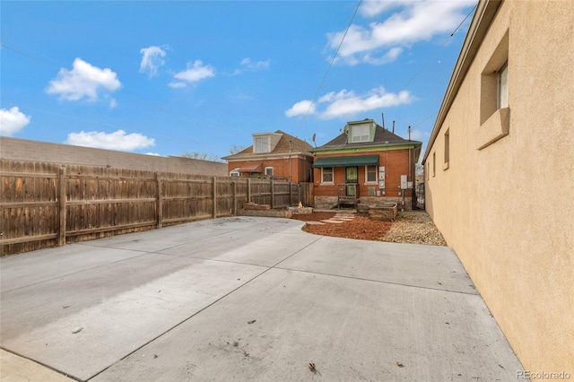 view of patio with fence