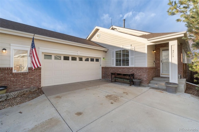 single story home featuring a garage