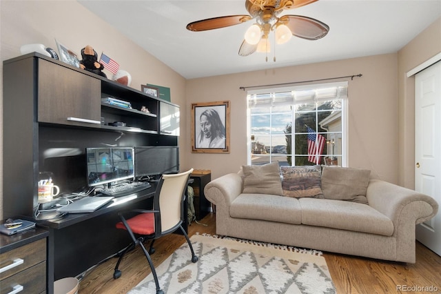 office space featuring light hardwood / wood-style flooring and ceiling fan