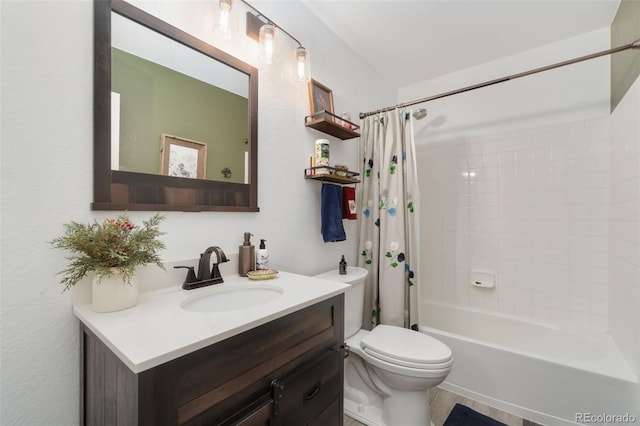 full bathroom with vanity, hardwood / wood-style floors, shower / bathtub combination with curtain, and toilet