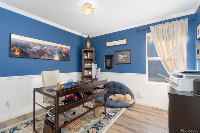 office area featuring light hardwood / wood-style flooring and ornamental molding