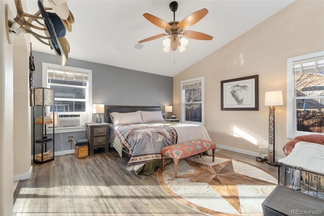 bedroom with wood-type flooring, vaulted ceiling, ceiling fan, and cooling unit