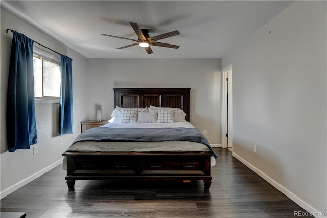 bedroom with a ceiling fan, baseboards, and dark wood-style flooring