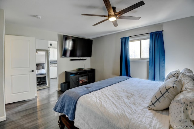 bedroom featuring ceiling fan and wood finished floors