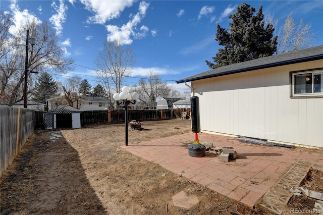 view of yard featuring a patio and a fenced backyard