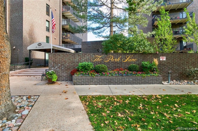 view of home's community with fence