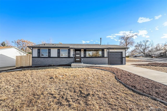 ranch-style home with a garage