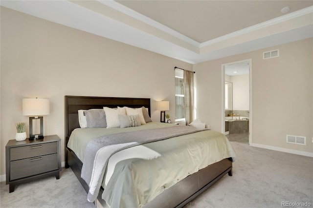 bedroom featuring light carpet, baseboards, crown molding, and ensuite bathroom