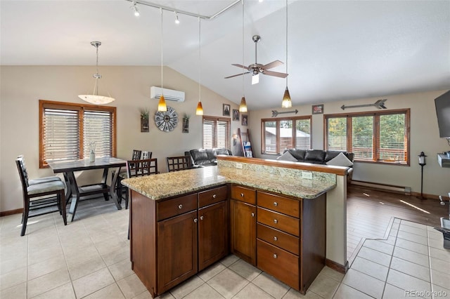 kitchen with lofted ceiling, ceiling fan, light hardwood / wood-style flooring, a baseboard radiator, and a wall mounted AC