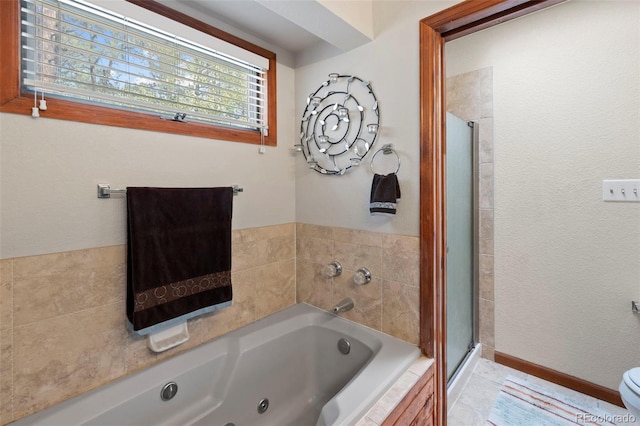 bathroom with independent shower and bath, toilet, and tile patterned floors