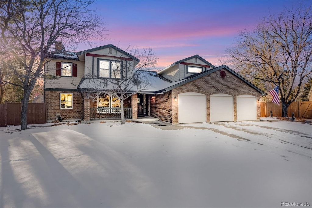 view of front of property with a garage