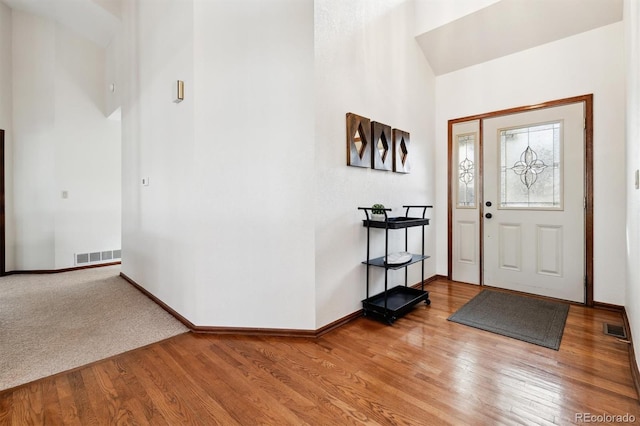 foyer featuring wood-type flooring