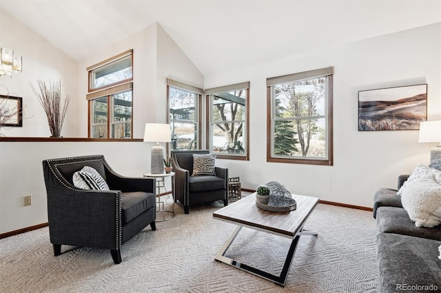 carpeted living room with vaulted ceiling