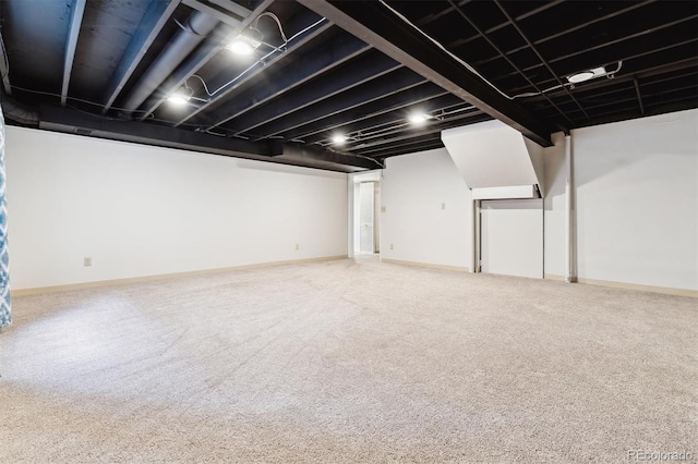 basement featuring carpet