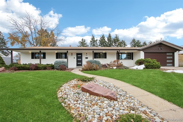 5886 S Logan St, Centennial, CO 80121 - single story home with an attached garage, a front yard, and concrete driveway