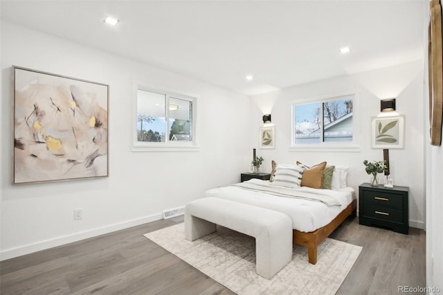 5886 S Logan St, Centennial, CO 80121 - bedroom with wood finished floors and recessed lighting