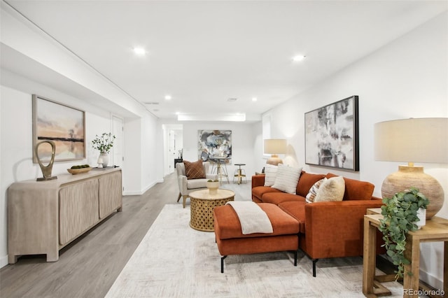 5886 S Logan St, Centennial, CO 80121 - living area featuring light wood-type flooring and recessed lighting