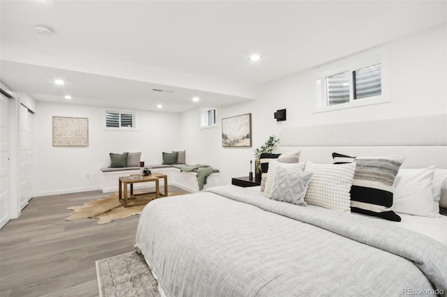 5886 S Logan St, Centennial, CO 80121 - bedroom with light wood-style floors and recessed lighting